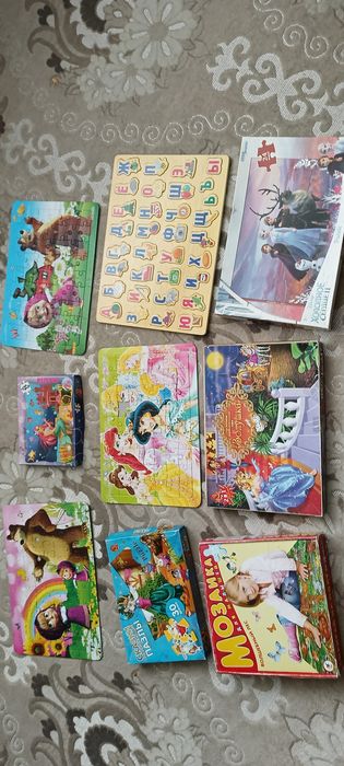 Пазлы и игры в ассортименте.