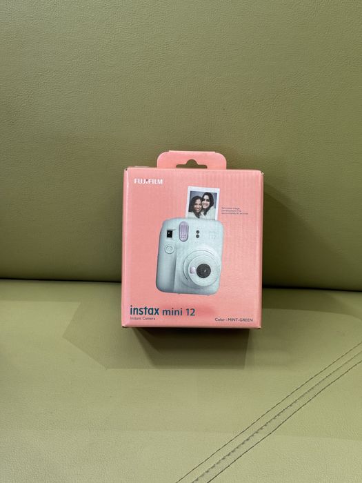 Не распакованный instax mini 12