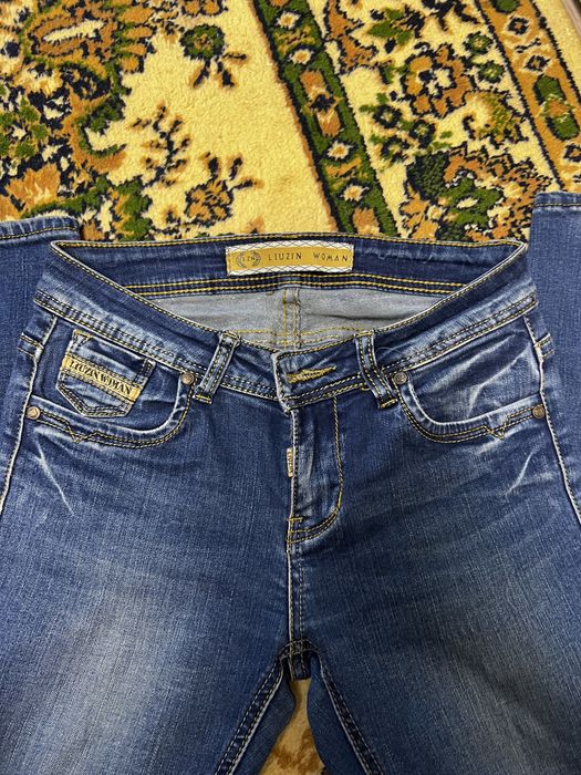 Джинсы женские