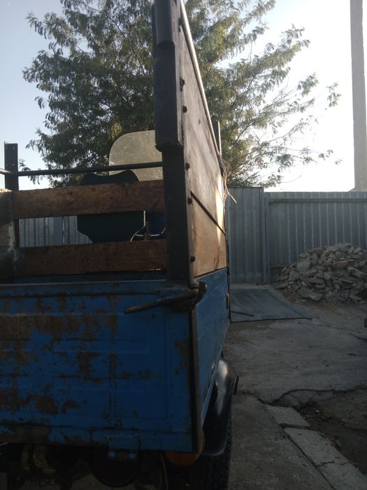 Муравей, мотоцикл