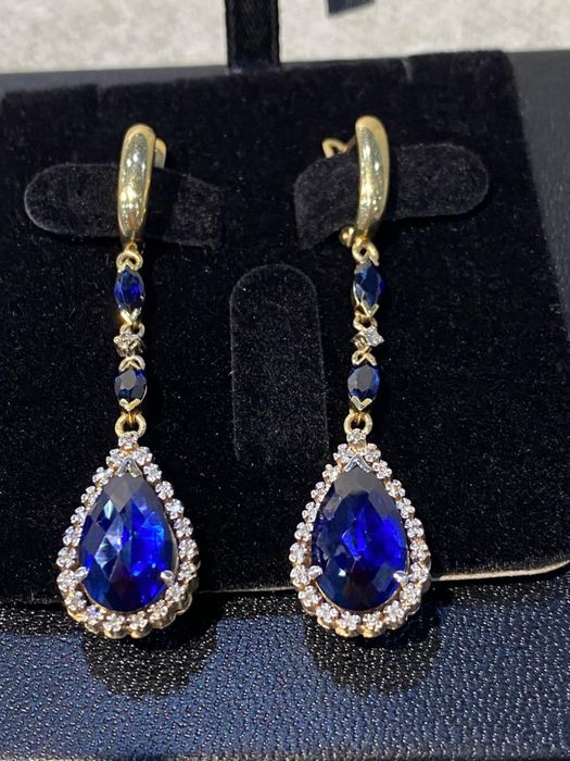 Продам золотые серьги с бриллиантами