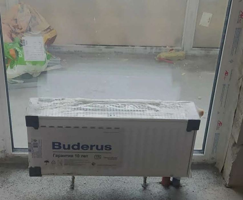 Настенное крепление панельных радиаторов