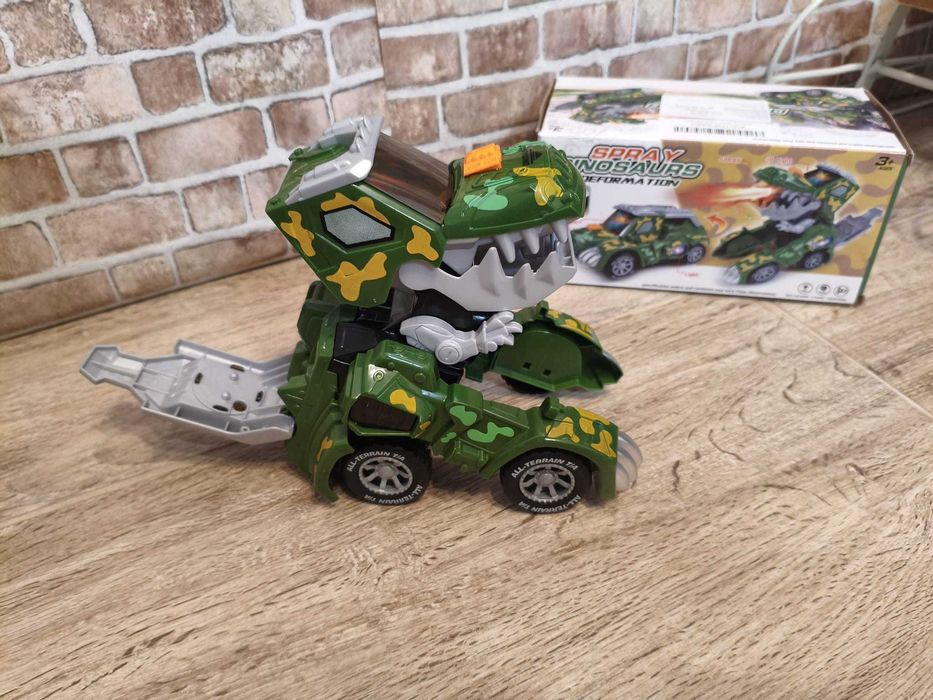 Jucărie dinozaur transformabilă cu lumini,muzică si ,,fum''