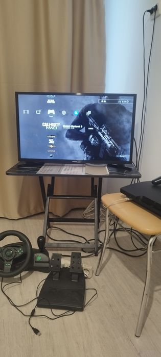 PS 3 modat  + Volan gaming (în garanție);(31 jocuri)   550 roni neg.