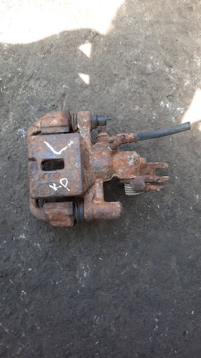Задний суппорт от мазды 626 GE кронус