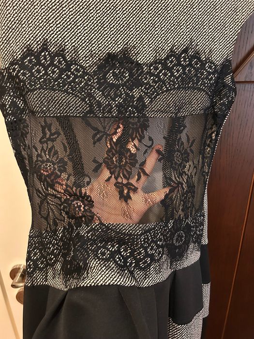 Дамска рокля с ефектен гръб