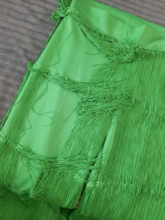 Pantaloni eleganti cu franjuri