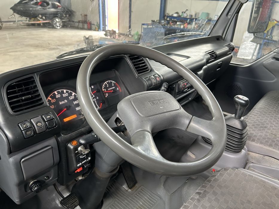 Isuzu NPR/ Basculabil pe cutie/128.000km reali/Recent adus