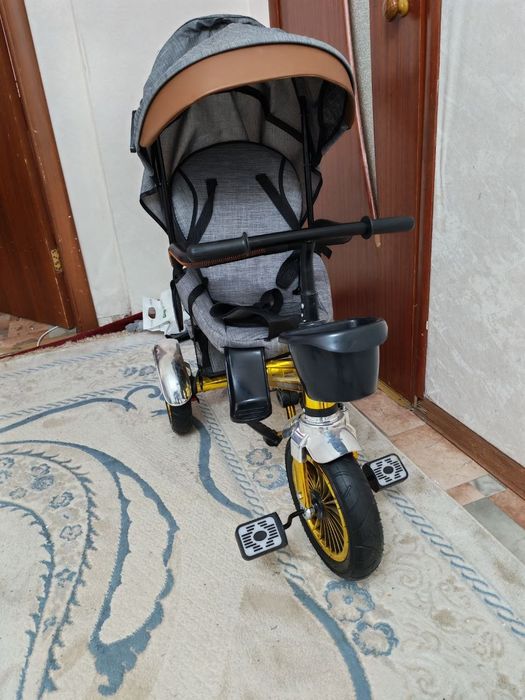 Детский трёхколёсный коляска сатылады.состояниеси жаксы почти новый