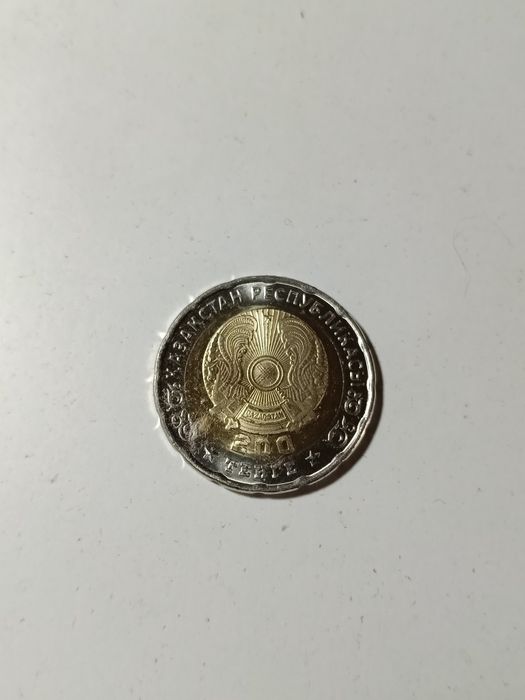 Продам монеты сто двести тенге