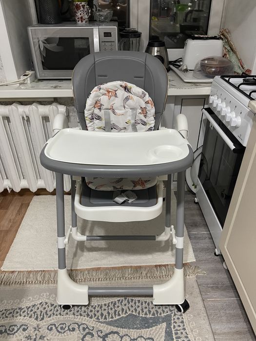 Стол для кормления-качеля.