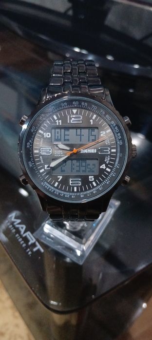 Часы Orient College.