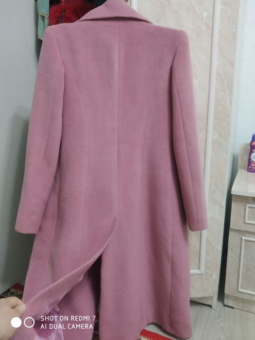 Пальто модная и стильная