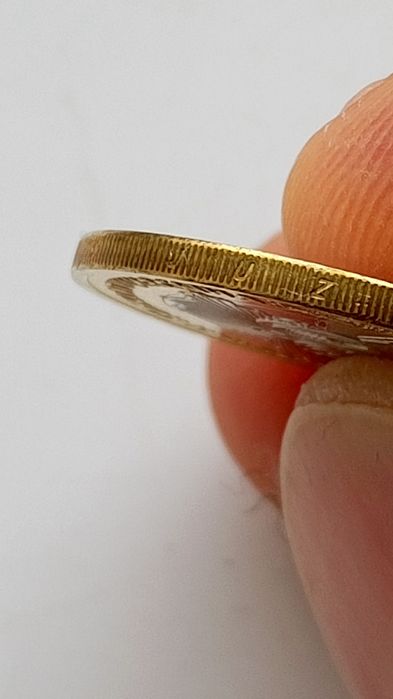 Продам монету 100 тенге