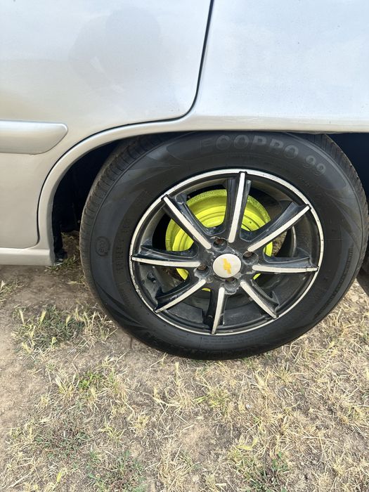 Продам Титановые диски с шинами
