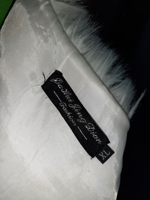 Меховая жилетка..