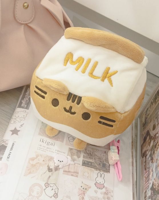 Мягкие игрушки котики