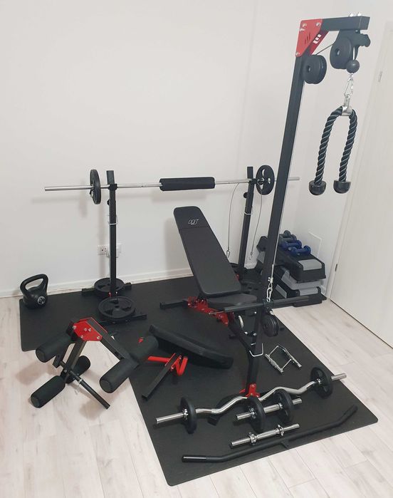 Sala de forta complet echipata (banca, scripete, haltera, gantere etc)