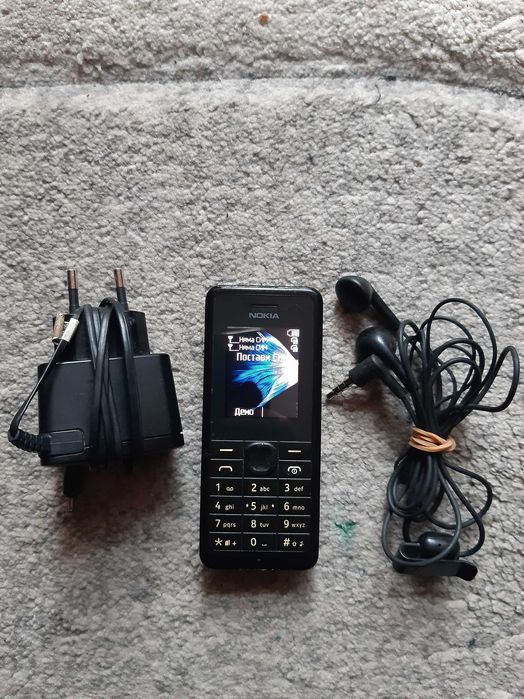 Мобилен телефон NOKIA 107, със зарядно у-во и слушалки