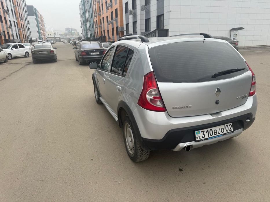 Reno Sandero 2013 год