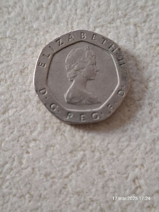 Moneda 20 pence, Elizabeth I', 1982 si bancnota 100 lei cu Balcescu
50