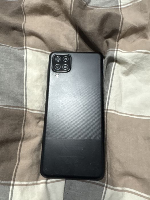 vand telefon Samsung A12