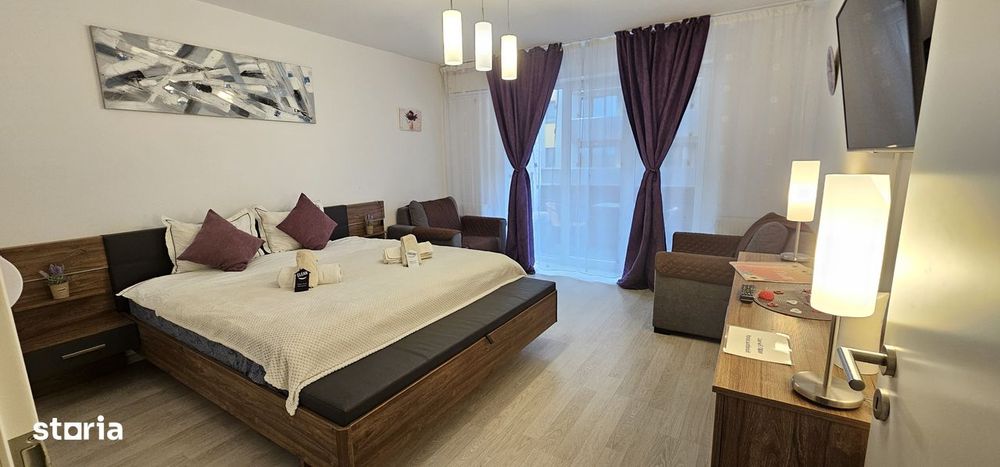 Garsonieră spațioasă cu balcon și parcare