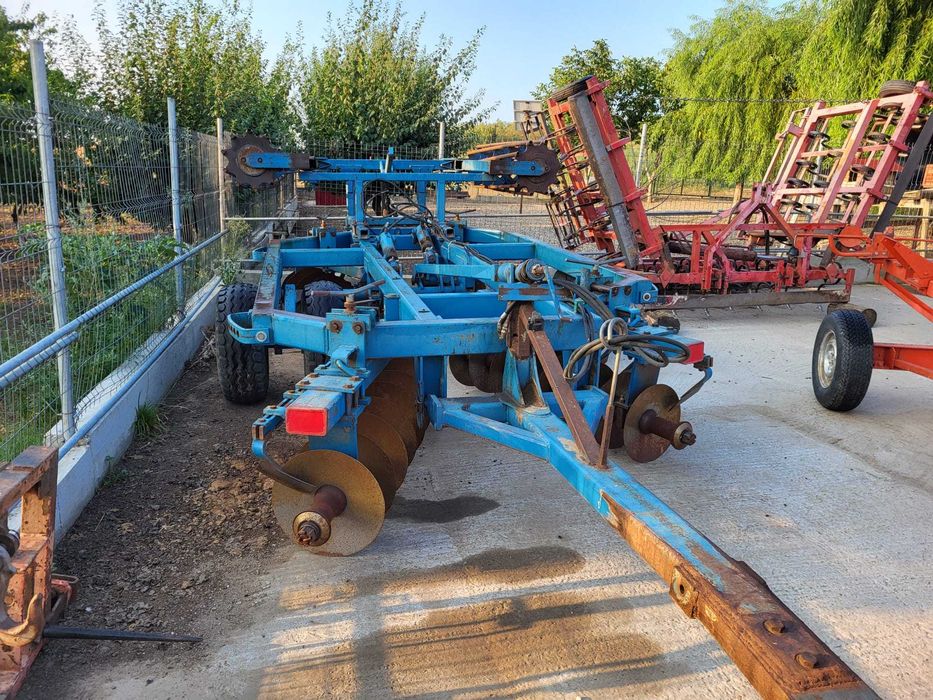 Disc greu rabatabil hidraulic Frost 4.40 m cu tavalug, perfecta stare