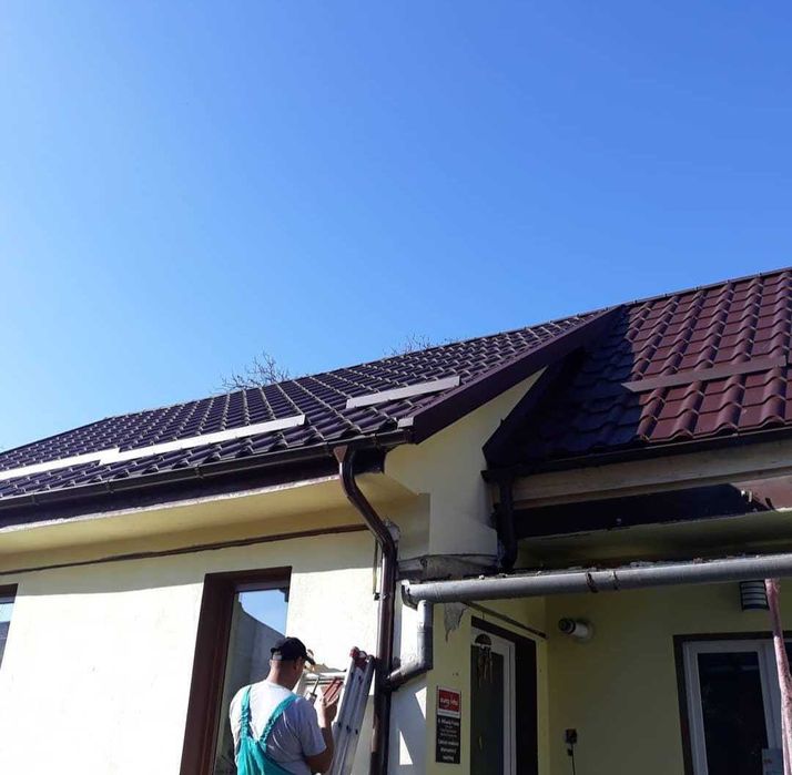 Reparatii acoperisuri, montaj acoperisuri, montaj tigla metalica, montaj tigla ceramica