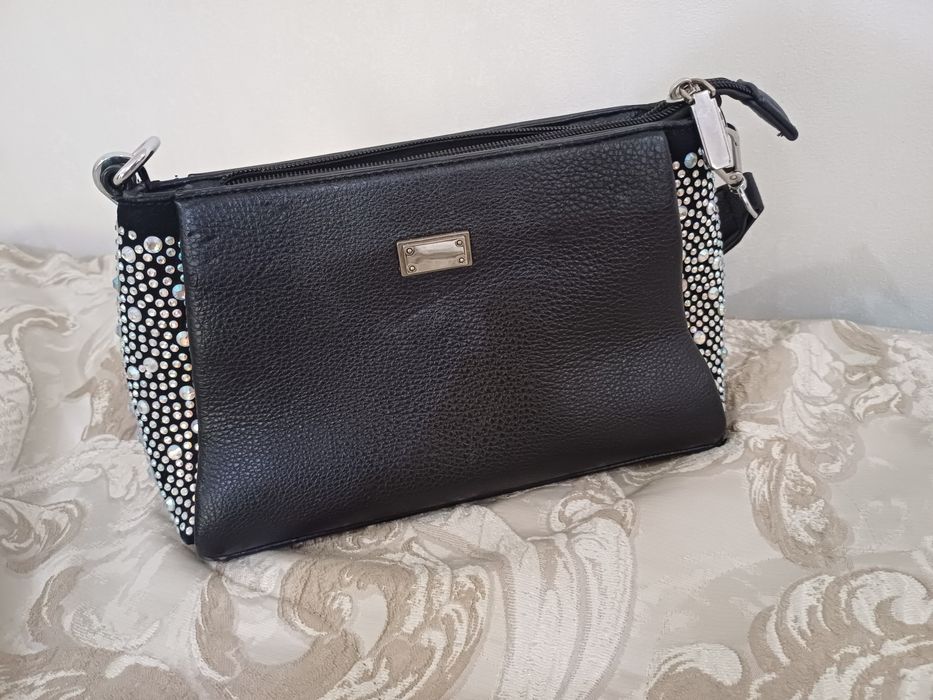 Кожаная сумочка с ремешками