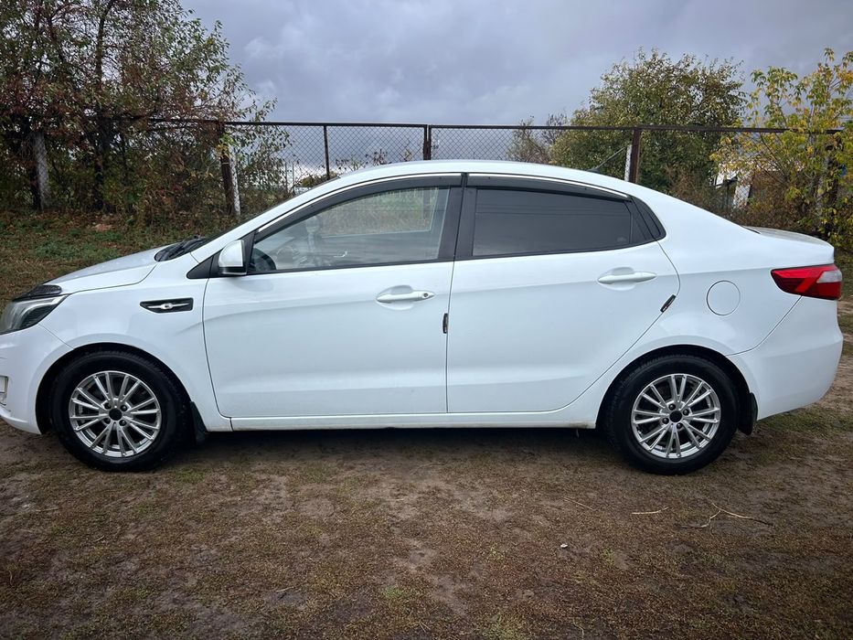 Kia Rio 2014 года