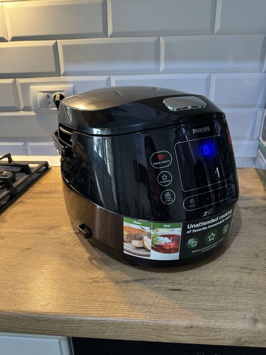 Multicooker Philips HD4749/70, 1070 W, 5 L, functie Slow-Cooker, 22 Programe automate, Negru