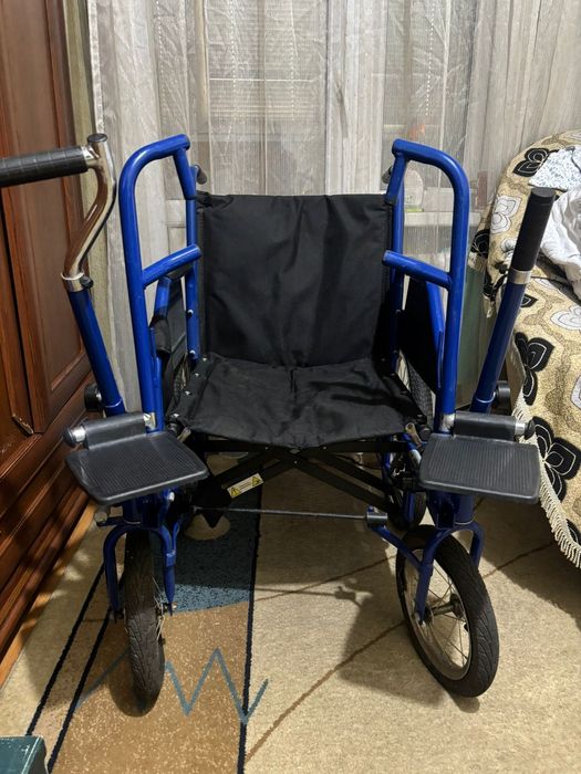 Инвалидная коляска