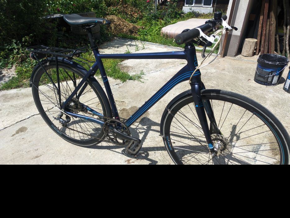 Bicicleta aproape noua