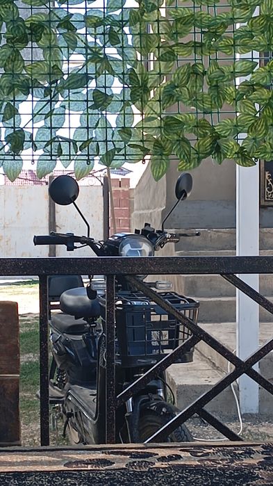 Скутер на тараза