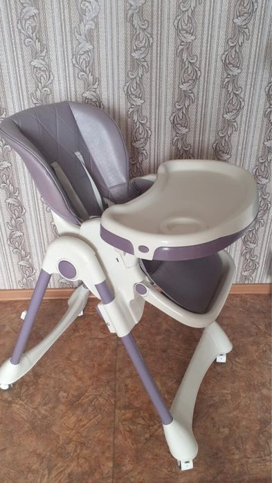 Продам коляску и стульчик для кормления