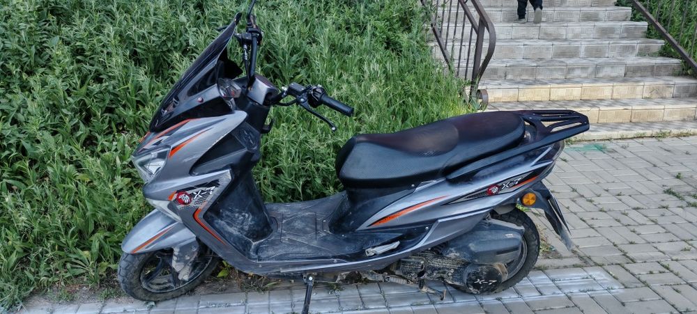 Скутер Maxi в хорошем состоянии