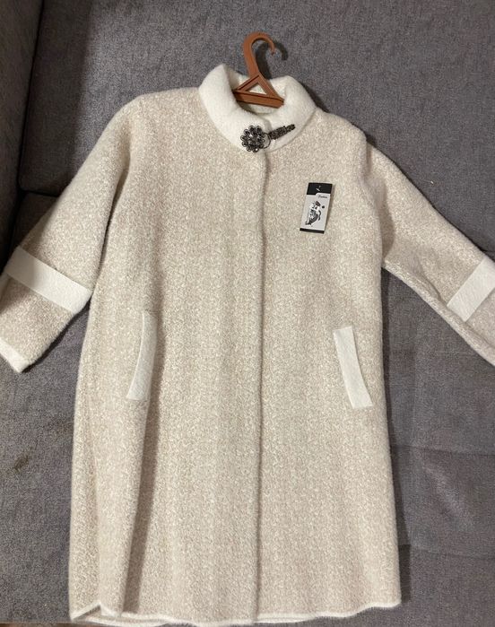 Продам пальто новое