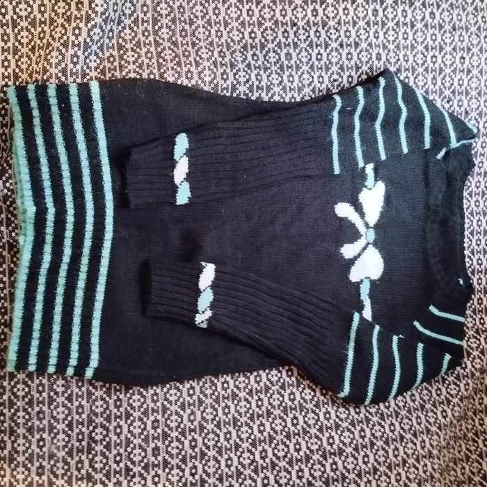 Теплые красивые свитера.