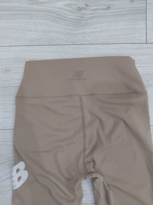 Тайтсы (легинсы) New Balance