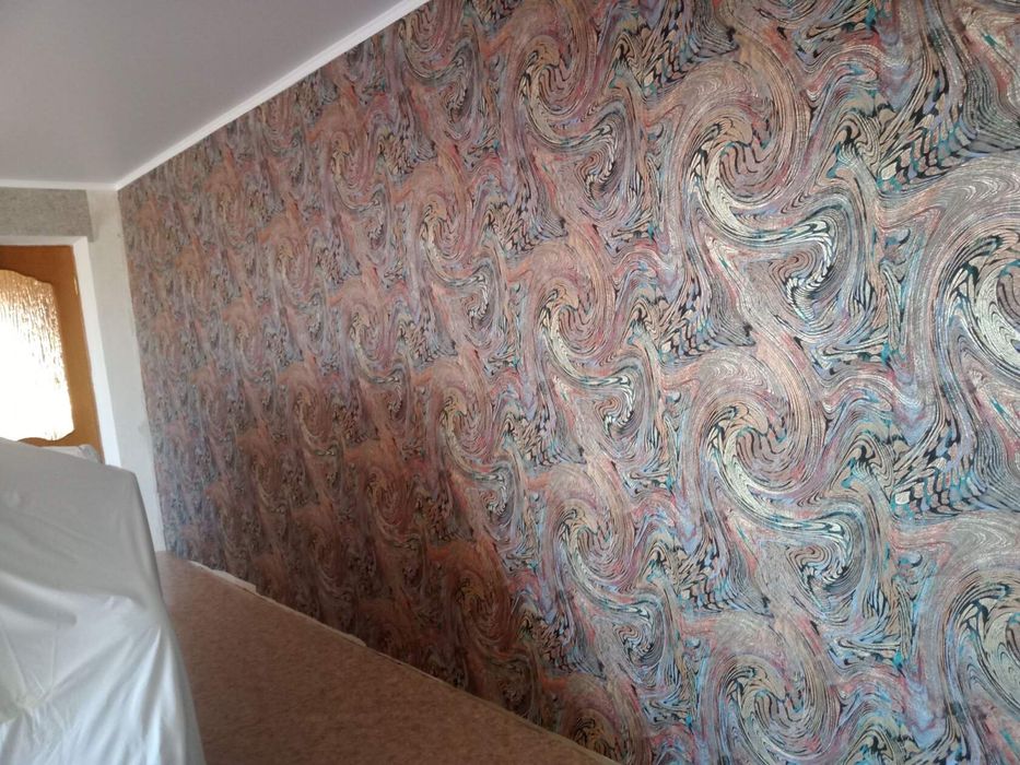 Поклейка обоев..