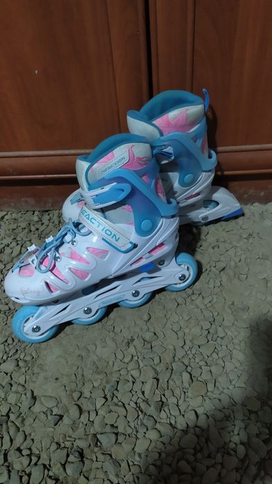 Роликовые коньки