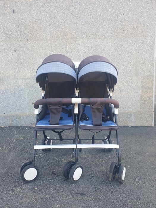 Детская коляска для близнецов