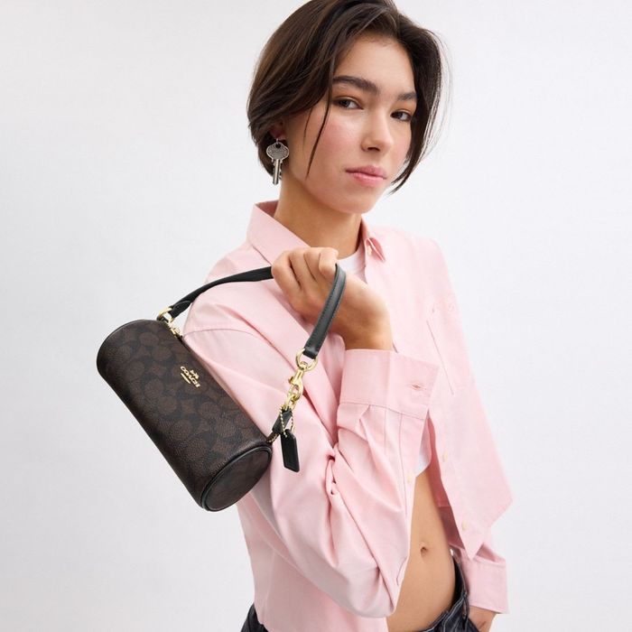 Чанта клъч Coach