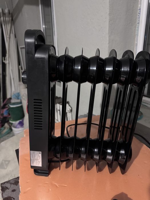 Масленый радиатор мошьный