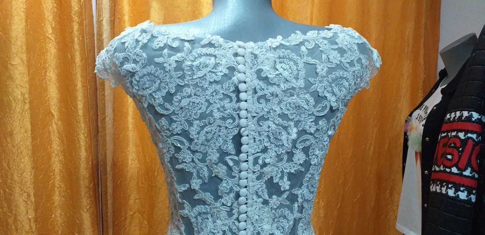 Сватбена рокля от колекцията на модна къща "Романтика"