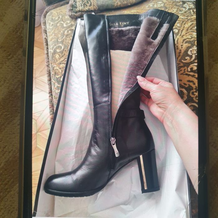 Продам зимние сапоги новые.