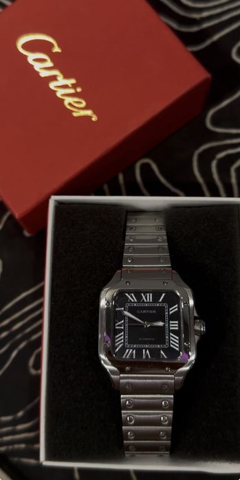 Cartier santos часовник