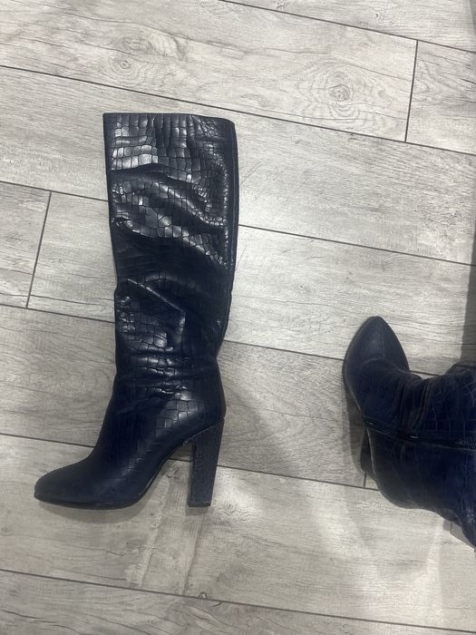 Продается кожанный сапоги