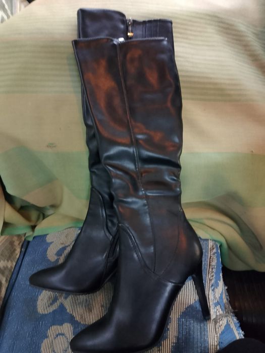 Продам новые сапоги